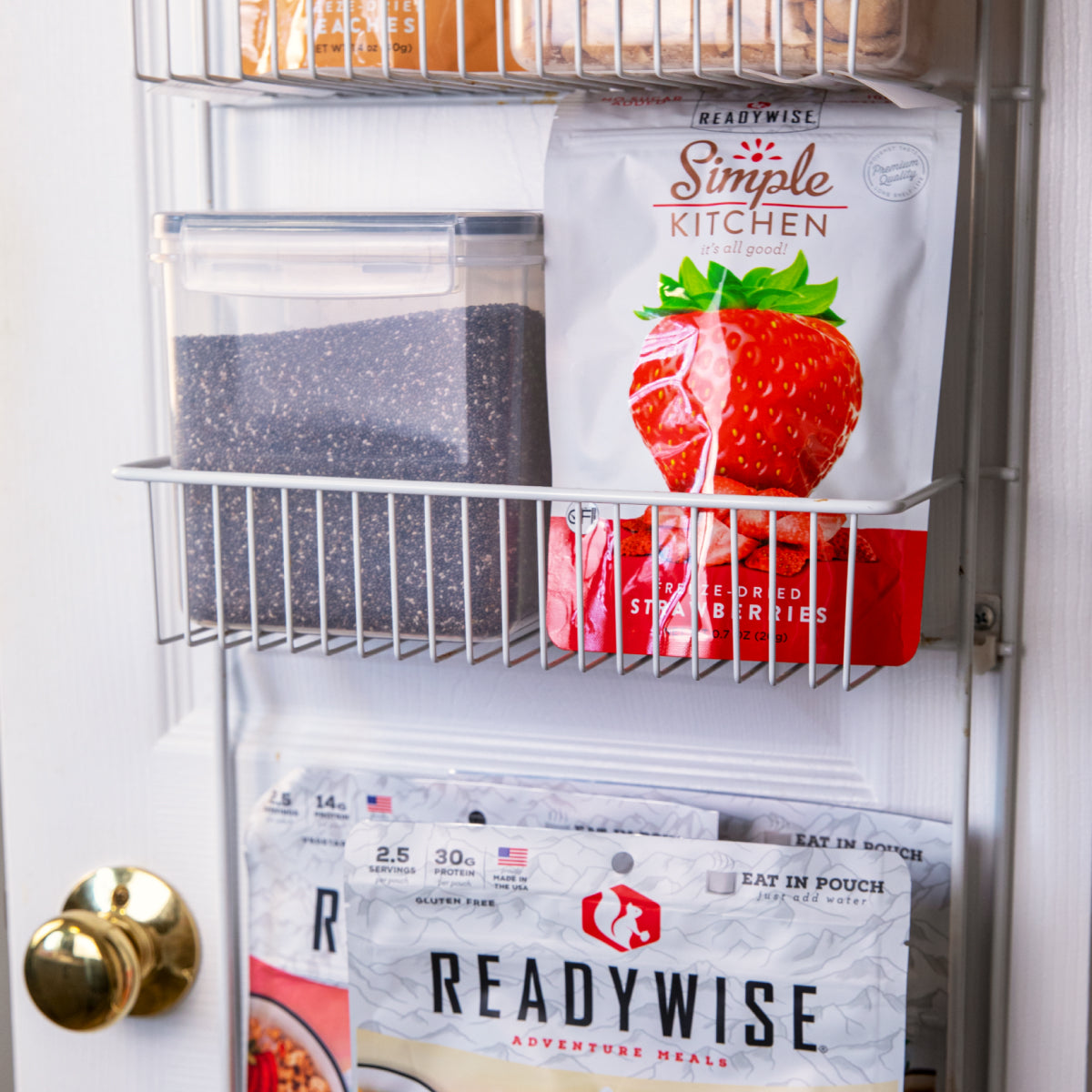 Readywise Emergency food pouch of freeze dried strawberries on a cutting board