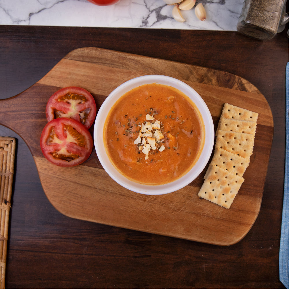 Readywise tomato basil soup prepared in a bowl and plated